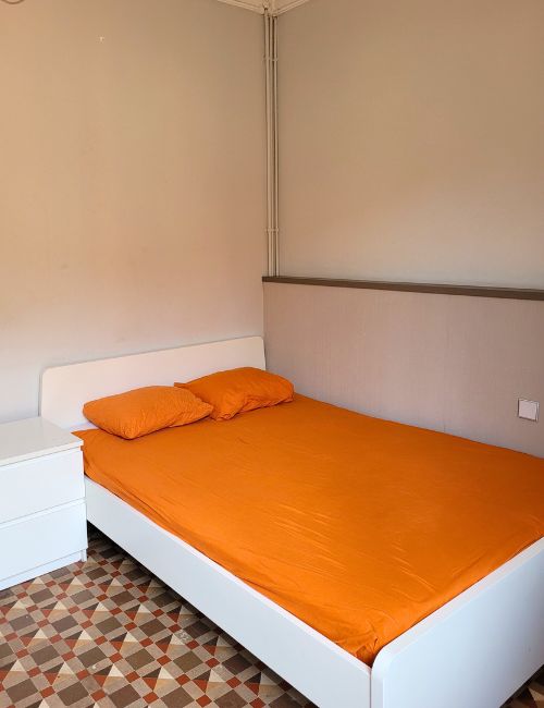 Double bed student accomodation room in Barcelona